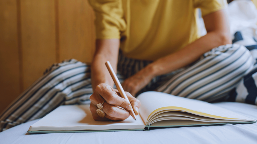 woman using journaling prompts for mental health